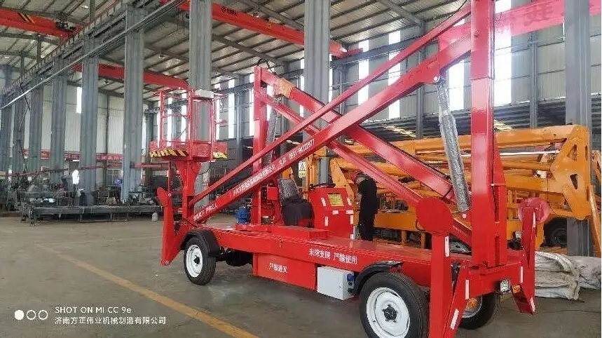 柴油(you)曲臂式(shi)升降機(ji)